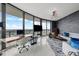 Open-concept living room featuring floor-to-ceiling windows with stunning city views and modern decor at 2103 Bayshore Blvd # 1701, Tampa, FL 33606