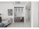 Elegant living room wet bar includes upper glass door cabinets and a beverage cooler at 2103 Bayshore Blvd # 1701, Tampa, FL 33606