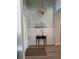 Bright entryway with nautical decor, shiplap wainscoting, and a round rope chandelier at 2217 5Th E St, Palmetto, FL 34221