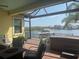 Enjoy the serene water views from the brick-paved patio with a built-in hot tub and comfortable seating at 2217 5Th E St, Palmetto, FL 34221