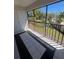 Enclosed patio with tile flooring offering a relaxing outdoor space with views of the surrounding landscape at 2971 Estancia Blvd # 225, Clearwater, FL 33761