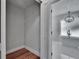 Bright bathroom boasts a modern tub, a decorative light fixture, and a glass-enclosed shower at 3004 Rolling Acres Pl, Valrico, FL 33596