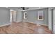 Spacious bedroom features hardwood floors, recessed lights, ceiling fan, and modern design at 3004 Rolling Acres Pl, Valrico, FL 33596