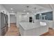 Updated kitchen with island, brick accents, and stainless appliances at 3004 Rolling Acres Pl, Valrico, FL 33596