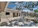 Open, spacious patio with a screened enclosure and lush landscaping in the backyard at 3004 Rolling Acres Pl, Valrico, FL 33596