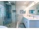 Spa-like bathroom with glass shower, dual sinks, and modern fixtures at 3302 W Caracas St, Tampa, FL 33614