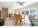Open dining area featuring tiled floors and sliding glass doors to the outdoors at 3302 W Caracas St, Tampa, FL 33614