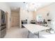 Spacious kitchen area with stainless steel refrigerator and plenty of counter space at 3302 W Caracas St, Tampa, FL 33614