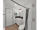 Bathroom featuring new vanity, modern fixtures and tile shower at 3309 Rock Royal Dr, Holiday, FL 34691