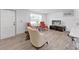 Inviting living room with neutral walls, modern floors, and cozy seating arrangement at 3309 Rock Royal Dr, Holiday, FL 34691
