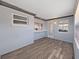 Enclosed patio space with durable floors and a view to the kitchen at 3309 Rock Royal Dr, Holiday, FL 34691