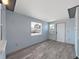 Well-lit room with neutral paint, modern floors, and window at 3309 Rock Royal Dr, Holiday, FL 34691