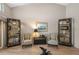 Cozy living room with a neutral color palette and bright accent lighting at 3579 Landmark Trl, Palm Harbor, FL 34684