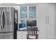 Convenient office nook next to the kitchen, perfect for working from home at 3579 Landmark Trl, Palm Harbor, FL 34684