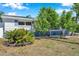Charming home featuring a meticulously landscaped front yard with lush greenery and vibrant curb appeal at 3624 Hendrix St, New Port Richey, FL 34652