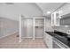 Efficient kitchen with built-in storage, sleek countertops, and modern appliances at 3624 Hendrix St, New Port Richey, FL 34652