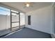 Bright sunroom with screened walls, gray floor, and views of the backyard providing a tranquil outdoor living space at 3624 Hendrix St, New Port Richey, FL 34652