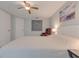 Relaxing bedroom with a comfortable bed, bedside tables, and soft lighting at 3633 Richboro Dr, Holiday, FL 34691