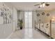 Charming bedroom with a comfortable bed, decorative accents, and a private outdoor view at 3633 Richboro Dr, Holiday, FL 34691