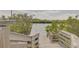 Wooden boardwalk leading to the water at 3633 Richboro Dr, Holiday, FL 34691