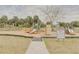 Well-maintained playground with multiple slides and swings at 3633 Richboro Dr, Holiday, FL 34691