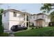 Modern home featuring a detached garage, and lush landscaping, ideal for outdoor living and entertainment at 445 36Th N Ave, St Petersburg, FL 33704