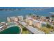 Stunning aerial view of waterfront condo buildings and surrounding canals, showcasing coastal living at 4725 Cove Cir # 810, St Petersburg, FL 33708