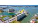 Beautiful aerial view of waterfront condominium featuring tennis courts and boat docks at 4725 Cove Cir # 810, St Petersburg, FL 33708