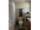 Cozy bathroom with tub-shower, neutral walls and decor at 4725 Cove Cir # 810, St Petersburg, FL 33708