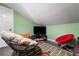 Cozy bonus room perfect for watching TV and relaxing in the privacy of your home at 4912 W Bay Way Dr, Tampa, FL 33629