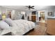 Bright main bedroom boasts a closet, TV, and en suite bathroom at 4912 W Bay Way Dr, Tampa, FL 33629