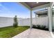 View of fenced backyard with a stone-tiled patio perfect for outdoor seating at 5530 N 9Th St # 1, Tampa, FL 33604