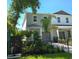 Charming two-story townhome with landscaped yard, fenced front, and a private entrance at 5530 N 9Th St # 1, Tampa, FL 33604