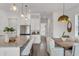 Kitchen with a view of the entryway, dining area, stainless steel appliances and granite countertops at 5530 N 9Th St # 1, Tampa, FL 33604