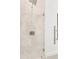 Close up of marble shower featuring modern showerhead and glass enclosure at 5530 N 9Th St # 1, Tampa, FL 33604