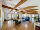 The open-concept living room features high ceilings, hardwood floors, and ample natural light at 5870 Jim Davis Rd, Parrish, FL 34219