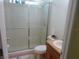 Bathroom featuring a glass-enclosed shower and vanity with a sink at 6130 Whimbrelwood Dr, Lithia, FL 33547