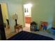 Bedroom featuring a doorway to an en suite bathroom at 6130 Whimbrelwood Dr, Lithia, FL 33547