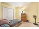 A bedroom with neutral walls, carpet floors, and a closet at 6130 Whimbrelwood Dr, Lithia, FL 33547