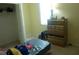 Bedroom featuring a dresser, a window, and ample storage space at 6130 Whimbrelwood Dr, Lithia, FL 33547
