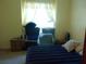 Bedroom featuring a window at 6130 Whimbrelwood Dr, Lithia, FL 33547