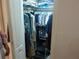 Walk-in closet with many hanging cloths at 6130 Whimbrelwood Dr, Lithia, FL 33547