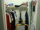 Walk-in closet featuring shelving for storage at 6130 Whimbrelwood Dr, Lithia, FL 33547