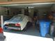 Spacious two-car garage with ample storage space and natural light at 6130 Whimbrelwood Dr, Lithia, FL 33547