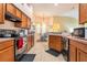 A spacious kitchen features ample cabinet space and modern appliances at 6130 Whimbrelwood Dr, Lithia, FL 33547