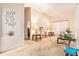 Spacious living room featuring ample natural light and neutral paint, great for hosting guests at 6130 Whimbrelwood Dr, Lithia, FL 33547
