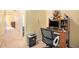 Home office featuring a desk, computer setup, and a comfortable ergonomic chair at 6130 Whimbrelwood Dr, Lithia, FL 33547
