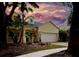 Charming home with well-manicured lawn, mature trees and an attached garage, inviting curb appeal at 6230 Gannetdale Dr, Lithia, FL 33547