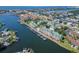 Aerial view of the community with marina and water views on a sunny day at 6451 Sunset Bay Cir, Apollo Beach, FL 33572