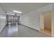 Garage with epoxy flooring plus access to the interior at 6451 Sunset Bay Cir, Apollo Beach, FL 33572
